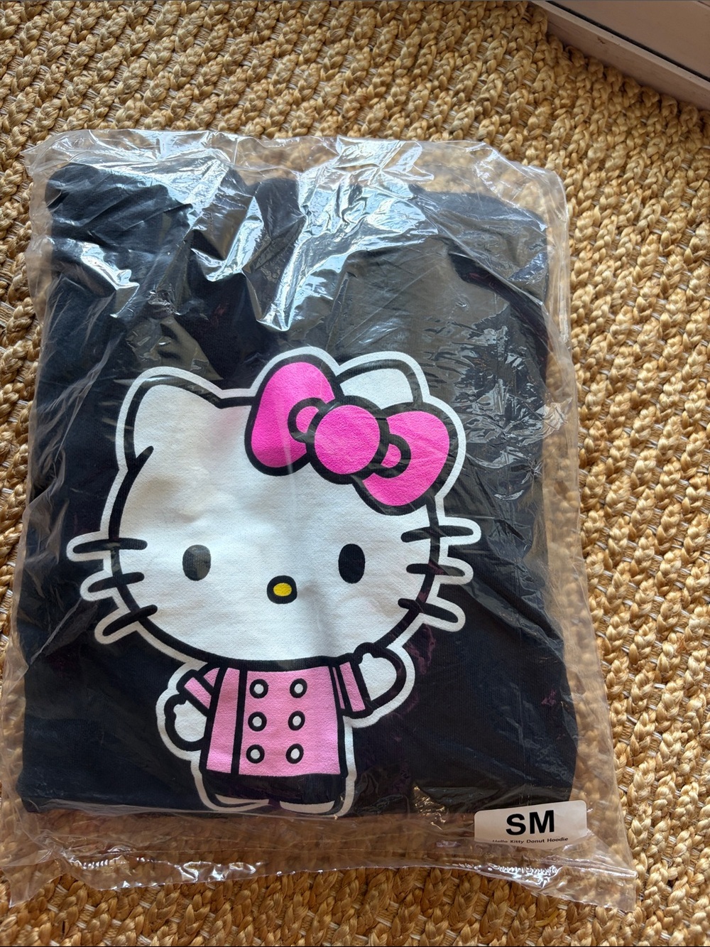Hello Kitty Black Sweater with Pink Bow and Pink Jacket Graphic